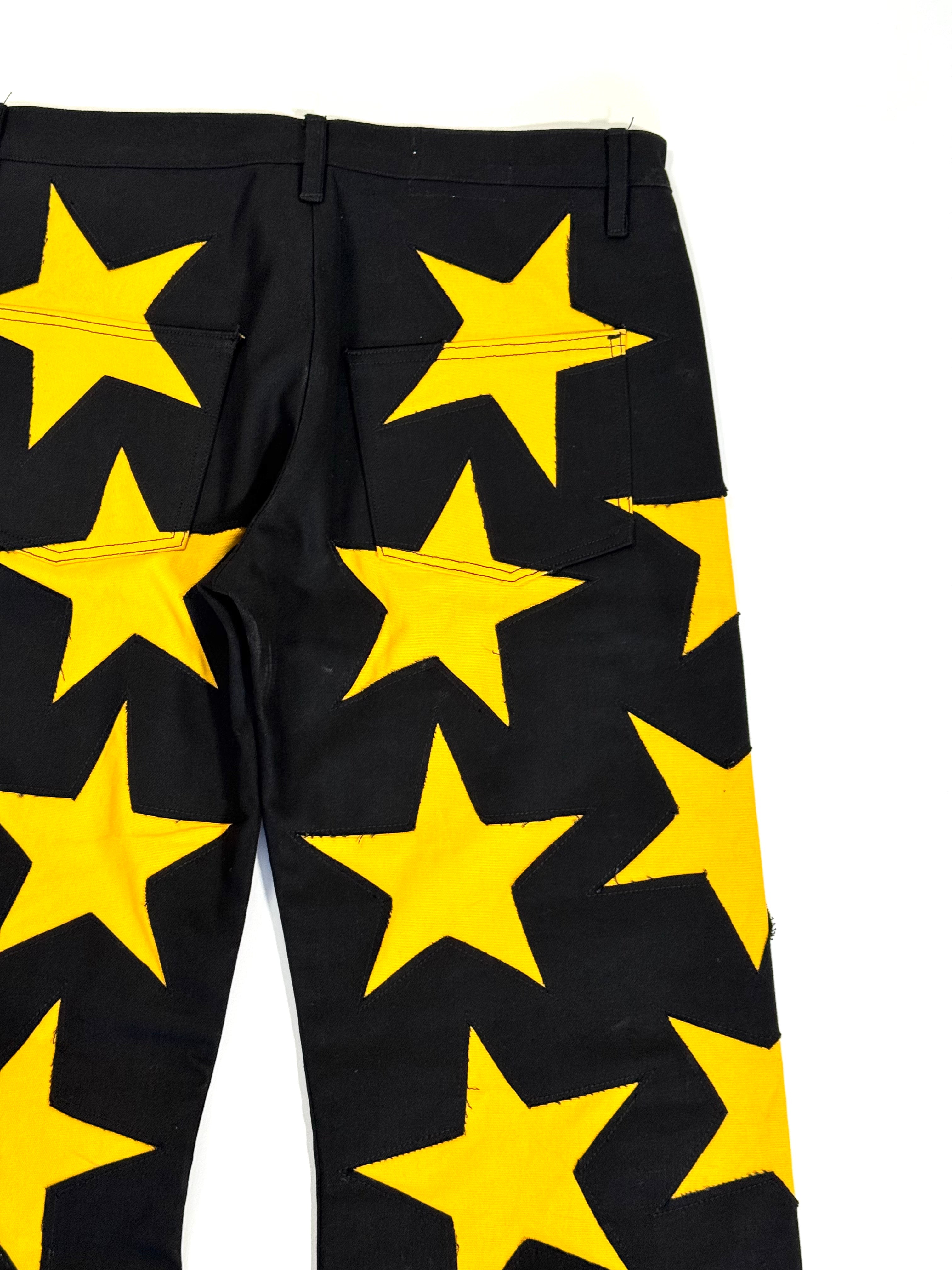 Black & Yellow All Over Star Jeans (Size 34)